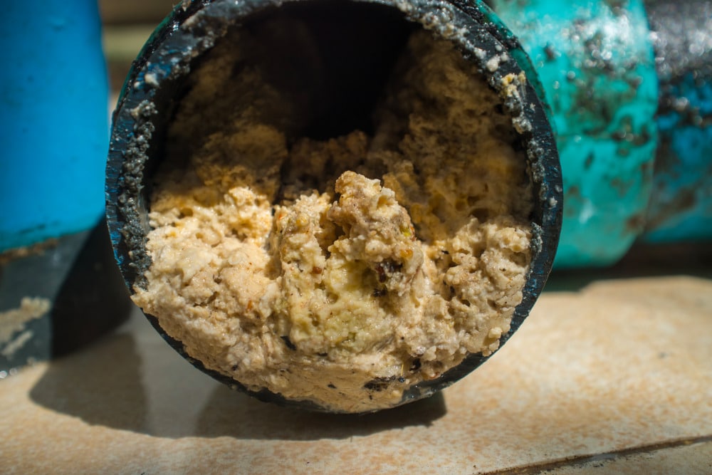 pipe-clogged-with-oil-and-grease